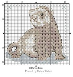 a cross stitch pattern with a bear on it