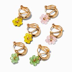 With no piercing needed, this clip-on hoop earrings set is the perfect finishing touch to your OOTD. The three pack has blush pink, green, and yellow beaded flowers. Pack Size: 3 pairFinish: Gold-toneSensitive Solutions Closure: Clip onMaterial: Plastic - Claire's Gold-tone Beaded Flowers Clip-On Hoop Earrings - 3 Pack Fun Clip On Earrings, Fun Clip, Sensitive Ears Earrings, Piercing Kit, Jewelry Words, Rainbow Cloud, Hair Accessories Gift, Fashionable Jewelry, Hoop Earring Sets