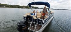 a group of people riding on the back of a boat