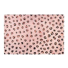 a pink and black animal print area rug