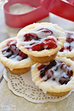 mini pies with strawberry filling on a plate