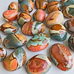 Approximate sizes: Small: .15-.25lbs - $12.99 Large: .26-.5lbs - $18.99 You will receive one intuitively selected Polychrome Jasper palm stone and a meaning card with your order. POLYCHROME JASPER KEY WORDS: ACTION, GROUNDING, STRENGTH Polychrome Jasper also known as Desert Jasper is made up of vibrant, earthy colors reminiscent of a desert landscape. This crystals energy is grounding and stabilizing - great for deepening your connection to Mother Earth. Its healing energies will reveal new paths to your deepest desires. Learn more about Polychrome Jasper on its meaning page! Jasper Properties, Desert Jasper, Polychrome Jasper, Crystal Aesthetic, Crystal Magic, Desert Landscape, Crystal Meanings