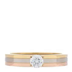 two tone gold and silver wedding ring set with a single diamond