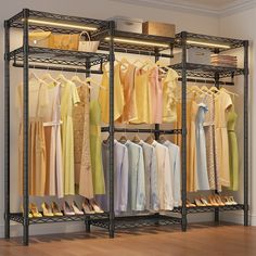 a rack with clothes and shoes on it in a room next to a wooden floor