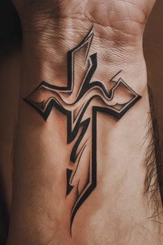 Stylized cross tattoo on a person's wrist with bold, angular designs. Cross Tattoo On Wrist, Cross Tattoos For Women, Cross Tattoo For Men, Explore Tattoo, Cross Tattoo, First Tattoo, Cross Designs, Wrist Tattoos, Tattoos For Guys