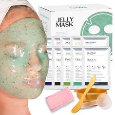 a woman's face is covered in green clay and surrounded by other beauty products