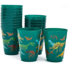 a stack of green cups with dinosaurs painted on the front and sides in different colors