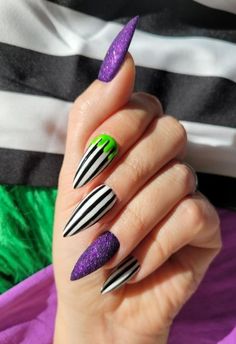 halloween nails 2024. beetlejuice nails. Beetlejuice Toenails, Beetle Juice Nail Art, Beetlejuice Inspired Nails, Freddy Nails, Bright Halloween Nails, Bettle Juice Nail Ideas, Beetlejuice Nails Short, Simplicity Nails, Beetlejuice Nails Acrylic