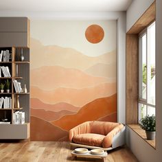 a living room with a couch, book shelf and large painting on the wall behind it