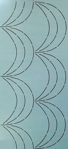 the back side of a piece of blue paper with black lines on it and an arrow drawn