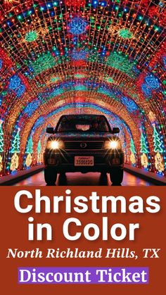 a car driving through a tunnel covered in christmas lights with the words christmas in color