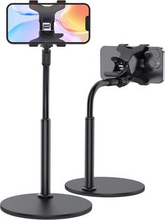 an iphone is attached to a tripod with a phone holder on the side and a smartphone in the middle