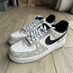 Custom Nike Air Force One Louis Vuitton Shoes. White And Grey With Black Swoosh. Lv Logos Are In A Glow In The Dark Paint. The Lv Logos Are White In The Light And Glow In The Dark When Charged. Custom Nike Shoes, Nike Air Force Ones, Custom Nikes, Louis Vuitton Shoes, White Nikes, Nike Air Jordan, Custom Shoes, Nike Air Force, Nike Men