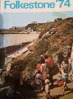 people are walking on the side of a hill