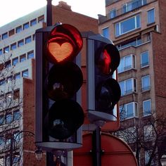 a traffic light with a heart on it