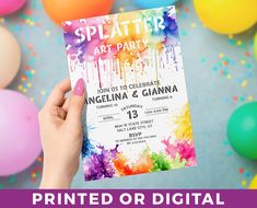 a hand holding up a splatter art party ticket with balloons in the background