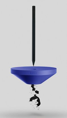 an upside down blue object with a black pole sticking out of it's center