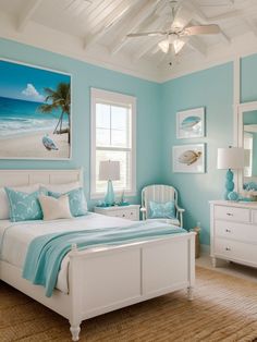 a bedroom with blue walls and white furniture