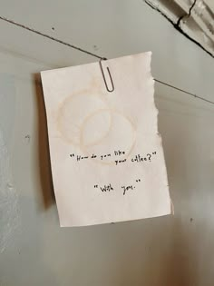 a piece of paper hanging on the wall with a note attached to it that says, you do you like?