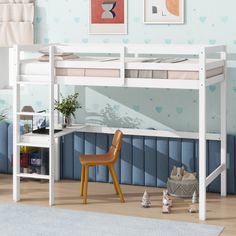 a white bunk bed with a desk underneath it