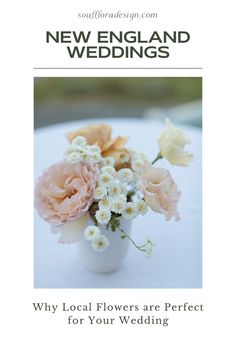 a white vase filled with flowers sitting on top of a table next to the words new england weddings