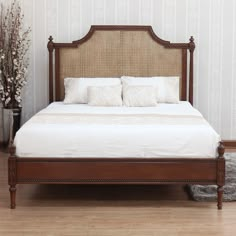 the bed is made and ready for someone to use it in their home or office