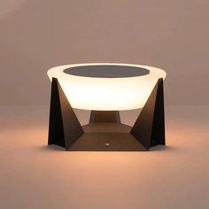 a modern table lamp with a white light on top