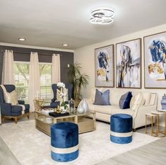 a living room with blue and white furniture