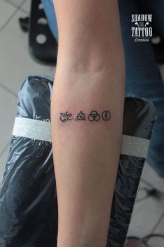 a person with a tattoo on their arm