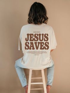 Introducing our new "Jesus Saves" tshirt, a perfect expression of faith and style. This Christian shirt features a timeless design and a powerful message. This shirt is not only a fashionable choice but also a meaningful one. It serves as a reminder of the saving grace of Jesus Christ and the hope and redemption that comes with it. It's a great way to boldly express your faith and share your beliefs with others! ⁑ F U N ⁑ F A C T S ⁑ ☼ Unisex Adult Sizes ☼ 100% Cotton ☼ Washer & Dryer Safe ☼ Pre Grace T Shirt Design, T Shirt Jesus Christ, Faith Shirt Ideas, Tshirt Design Christian Faith, Cute Christian Shirts For Women, Cute Jesus Shirts, Church T Shirt Designs, Faith Based Apparel, Christian Streetwear T-shirts