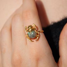 This beautiful ring is made in Sterling Silver and coated with a thick layer of 24K Yellow Gold to a Gold Vermeil thickness and set with a natural Labradorite. 24K Gold Vermeil jewelry is not only hypoallergenic, but it also does not tarnish.  Your ring is meticulously handcrafted and hand-polished to perfection. It is made to last a lifetime with proper care. This is a unique piece of minimalist jewelry for everyday wear.  Please note: Due to the one-of-a-kind nature of the gemstone, exact colo Crystal Rings Gold, Moon Face Ring, Nature Accessories, Layering Rings, Scarab Ring, Scarab Jewelry, Gold Jewelry Aesthetic, Yellow Gemstone Ring, Gold And Silver Ring