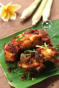 some food is sitting on a green leaf