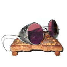 "Antique Fuchsia [Pink / Purple] Willson Sunglasses Goggles" Details: - Brand / Country Of Manufacturer: Willson / Usa - Era / Year: 1920's (Pat. 1918) - Frame Material: Silver Tone Metal - Lens Color: Super Rare Fushsia Pink Nonprescription Glass Lenses - Condition: Very Good Vintage Condition With Minimal Wear (Minor Tarnish And Scuffing From Age) * Original Willson Tin Case Included (Some Wear And Corrosion) Paypal Is Accepted. Best Offers Are Welcome. Free Shipping To The Usa! * Domestic Cus Spy Equipment, Steampunk Glasses, Steampunk Gadgets, Tin Case, Tortoise Shell Sunglasses, Safety Glasses, Antiques For Sale, Fuchsia Pink, Sunglasses & Glasses