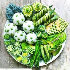 a white plate topped with different types of vegetables