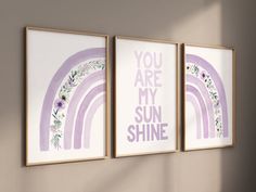 three framed art prints with the words you are my sun shine in purple and blue