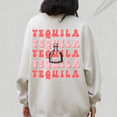 Tequila Sweatshirt- Unisex Ideal gift those tequila lovers and party people! Unisex heavy blend crewneck sweatshirt is pure comfort. Made from polyester and cotton. This combination helps to give a trendy and comfy look. The collar is ribbed knit, so it retains its shape even after washing. No itchy side seams. 50% cotton 50% polyester Medium-heavy fabric Loose fit Sewn-in label Runs true to size ... Tequila sweatshirt, Alcohol sweatshirt, Funny sweatshirt, Alcohol gift, Tequila gift, Gift for t Gift Alcohol, Tequila Gift, Sweatshirt Preppy, Preppy Sweatshirts, Cute Shirt Designs, Bridesmaid Shirts, Party People, Bachelorette Party Shirts, Funny Sweatshirts