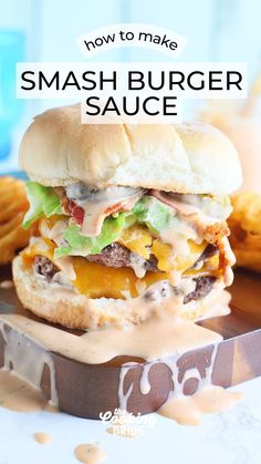 a cheeseburger is sitting on top of a plate with fries in the background