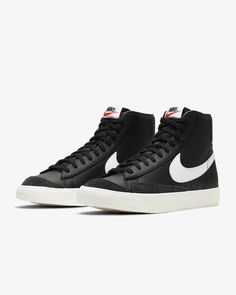 NEW MEN NIKE BLAZER MID '77 VINTAGE BASKETBALL SHOES MEDIUM COLOR: BLACK - WHITE - SILVER LEATHER - SYNTHETIC SIZES 8 - 8.5 - 9 - 9.5 - 10 - 10.5 - 11 - 12 - 13 SKU # DM1124 002 DESCRIPTION: VINTAGE STYLE. In the ‘70s, Nike was the new shoe on the block. So new in fact, we were still breaking into the basketball scene and testing prototypes on the feet of our local team. Of course, the design improved over the years, but the name stuck. The Nike Blazer Mid ’77 Vintage—classic since the beginning. Benefits Leather and synthetic upper keeps the classic look of the original while adding comfort and support. Vintage treatment on the midsole provides an old-school look. Autoclave construction fuses the outsole to the midsole for a streamlined look that echoes the ‘70s design. Exposed foam on th Estilo Cholo, Blazer Mid 77 Vintage, Basket Vintage, Nike Blazer Mid 77, Nike Models, Nike Blazer Mid, Black Leather Sneakers, Nike Blazers Mid, Black And White Shoes