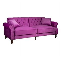 a purple couch sitting on top of a white floor