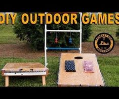 an outdoor game set up in the grass with american flags on it and a sign that says diy outdoor games