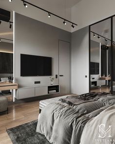 a large bedroom with mirrored walls and floor to ceiling mirrors on the wall above the bed