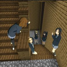 several anime characters are standing in an empty room with stairs and wooden walls, while one looks at the camera