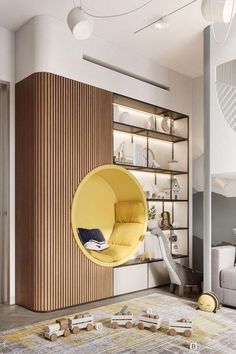 a yellow chair hanging from the ceiling in a living room with bookshelves and shelves