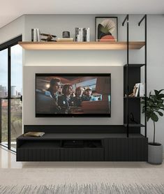 a flat screen tv mounted to the side of a wall