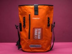 Dry Tank 25L orange roll top unisex backpack - rucksack. Made from tarpaulin, waterproof material. For woman and men. By Bagology London Orange Roll, Yellow Backpack, Orange Backpacks, Unisex Backpack, Waterproof Backpack, Roll Top, Waterproof Bags, Black Plastic, Bagpack