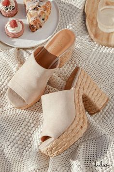 To complete any summer-ready ensemble, you're going to need the Lulus Ervyn Light Nude Suede Raffia Platform Slide Sandals! Smooth faux suede shapes a peep-toe upper and a wide toe strap (with a stretchy elastic gusset at the instep) that sits atop a contrasting 1.5"" raffia-wrapped toe platform and a matching block heel. An easy slip-on design makes these chic heels a must-have for any sunny weather occasion! 4. 25" wrapped block heel. Cushioned insole. Felted rubber sole has nonskid markings. Platform Slide Sandals, Summer Wedges, Chic Heels, Sunny Weather, Amelia Island, Sandal Heels, Shoe Inspiration, Platform Slides, Cute Sandals