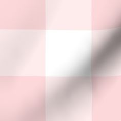 a pink and white checkered background with soft folds