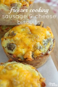 three sausage and cheese muffins sitting on top of each other