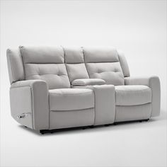 the reclining sofa has two seats on it