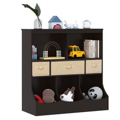 a book shelf with two drawers and stuffed animals